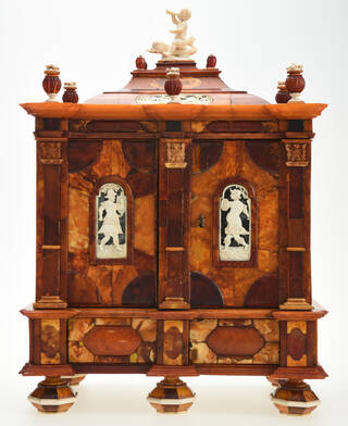 Amber cabinet inlaid with ivory decoration