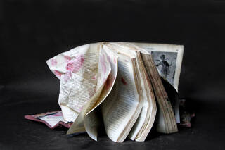 book folded and stained