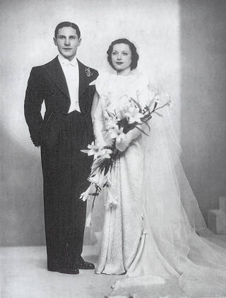 Black and white photograph of a couple on their wedding day