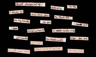 Cut up pieces of paper with hand written words on them