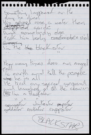 hand written words on a torn out sheet of lined paper