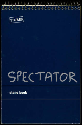 Dark blue front cover of a ring bound notebook with 'Spectator' written on it