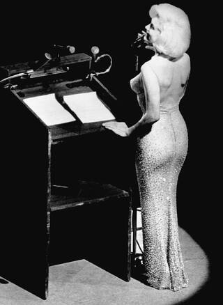 Photo of actress Marilyn Monroe singing 'Happy Birthday' to President John F. Kennedy at Madison Square Gardens 