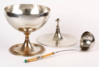 covered soup tureen and ladle