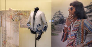 a kimono jacket and kimono on display alongside a photograph of Freddie Mercury